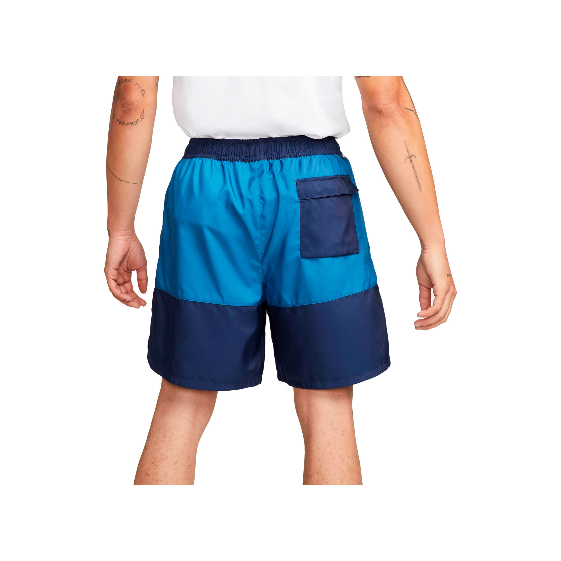 Nike Pantalón Corto Hombre M NSW SPE WVN FLOW LONG SHORT vista trasera Nike Pantalón Corto Hombre M NSW SPE WVN FLOW LONG SHORT vista trasera